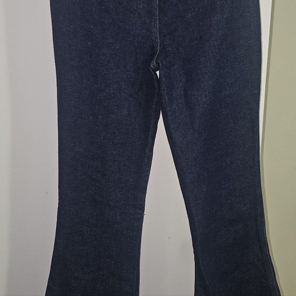 Spanx Tall Medium bootcut/flare jeans in dark wash denim.